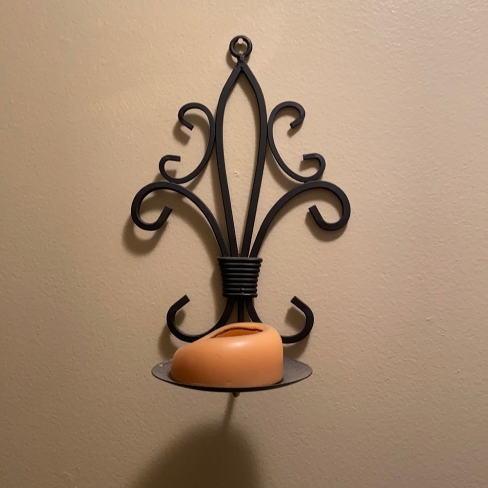 Wall candle holders.